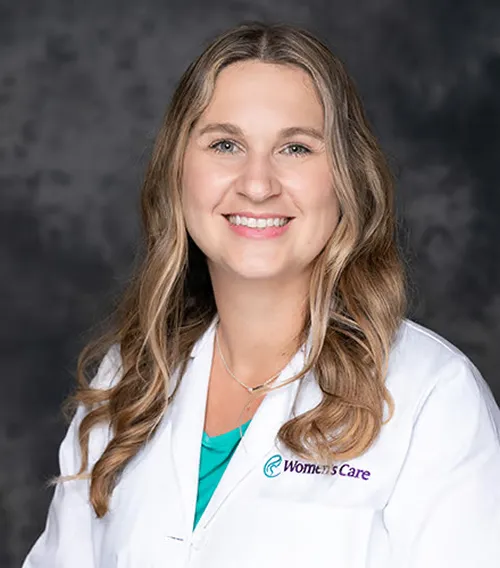 Experienced nurse midwife supporting hospital deliveries